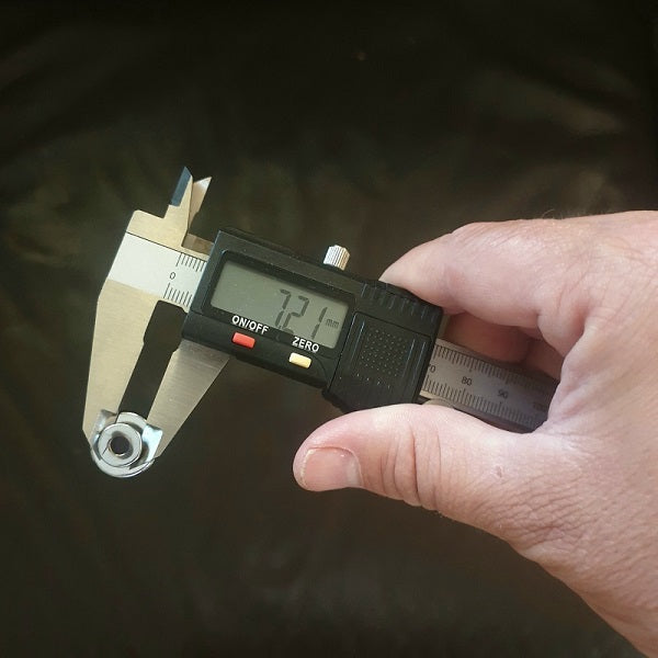 Caliper for check the hole size that you need in your guitar strap
