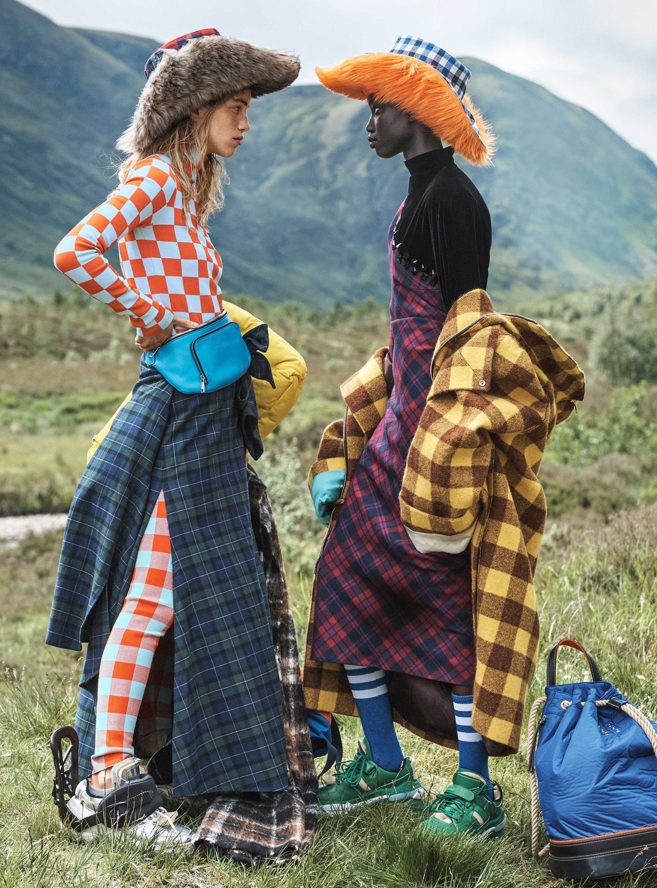 Vogue Magazine models in the highlands wearing tartan