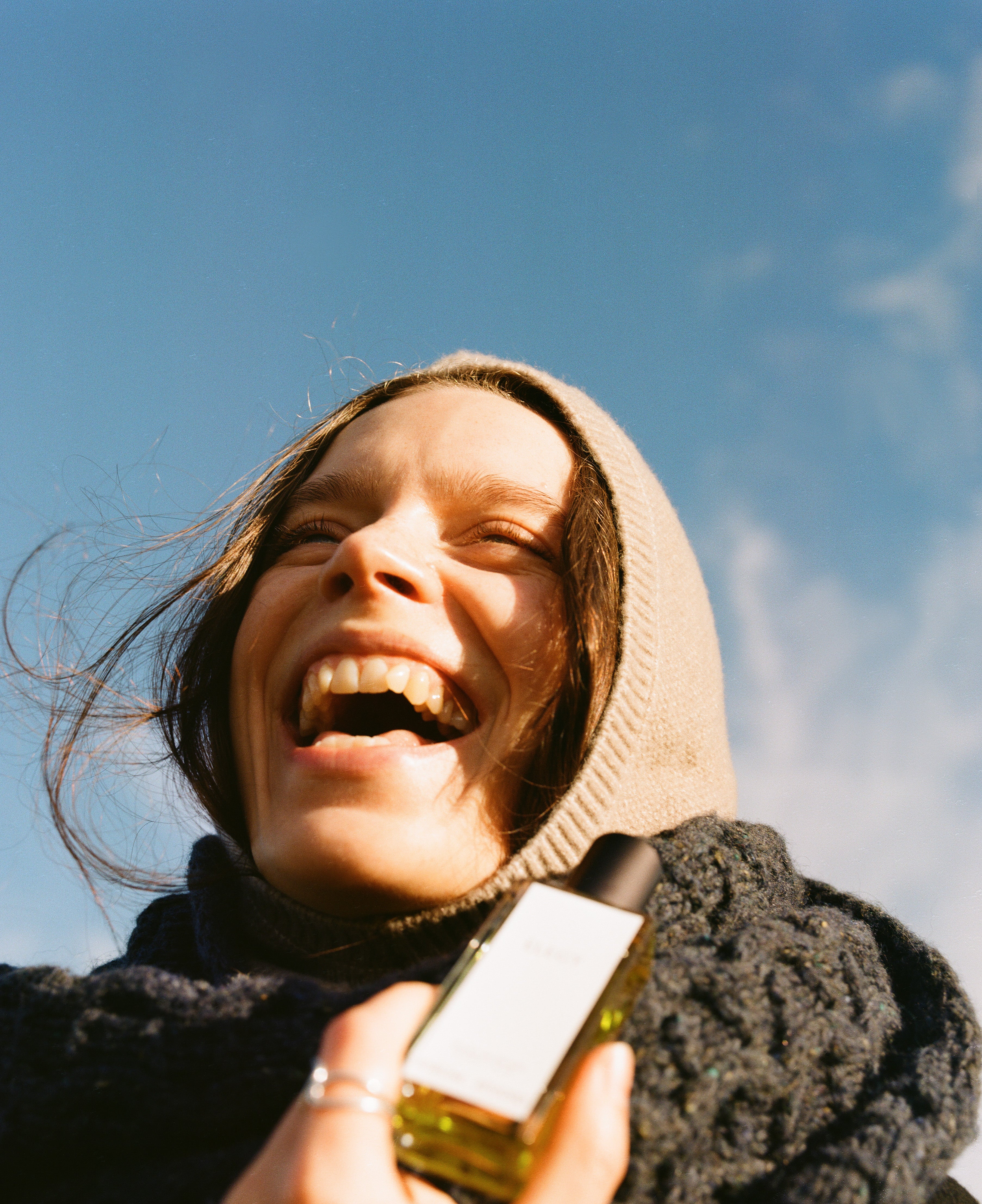 Jorum Studio Winter Campaign close up of model laughing