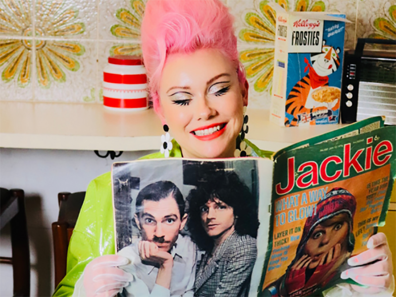 Jade Moss reading a vintage magazine