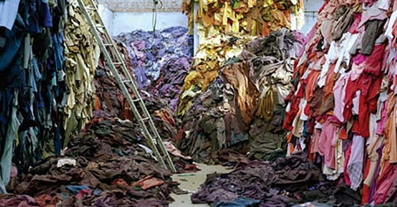 Large piles of different fabrics