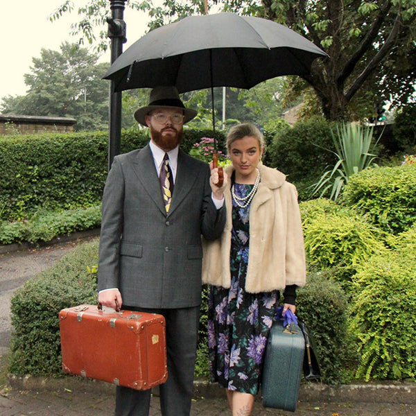 an umbrella is essential to protect your vintage outfit