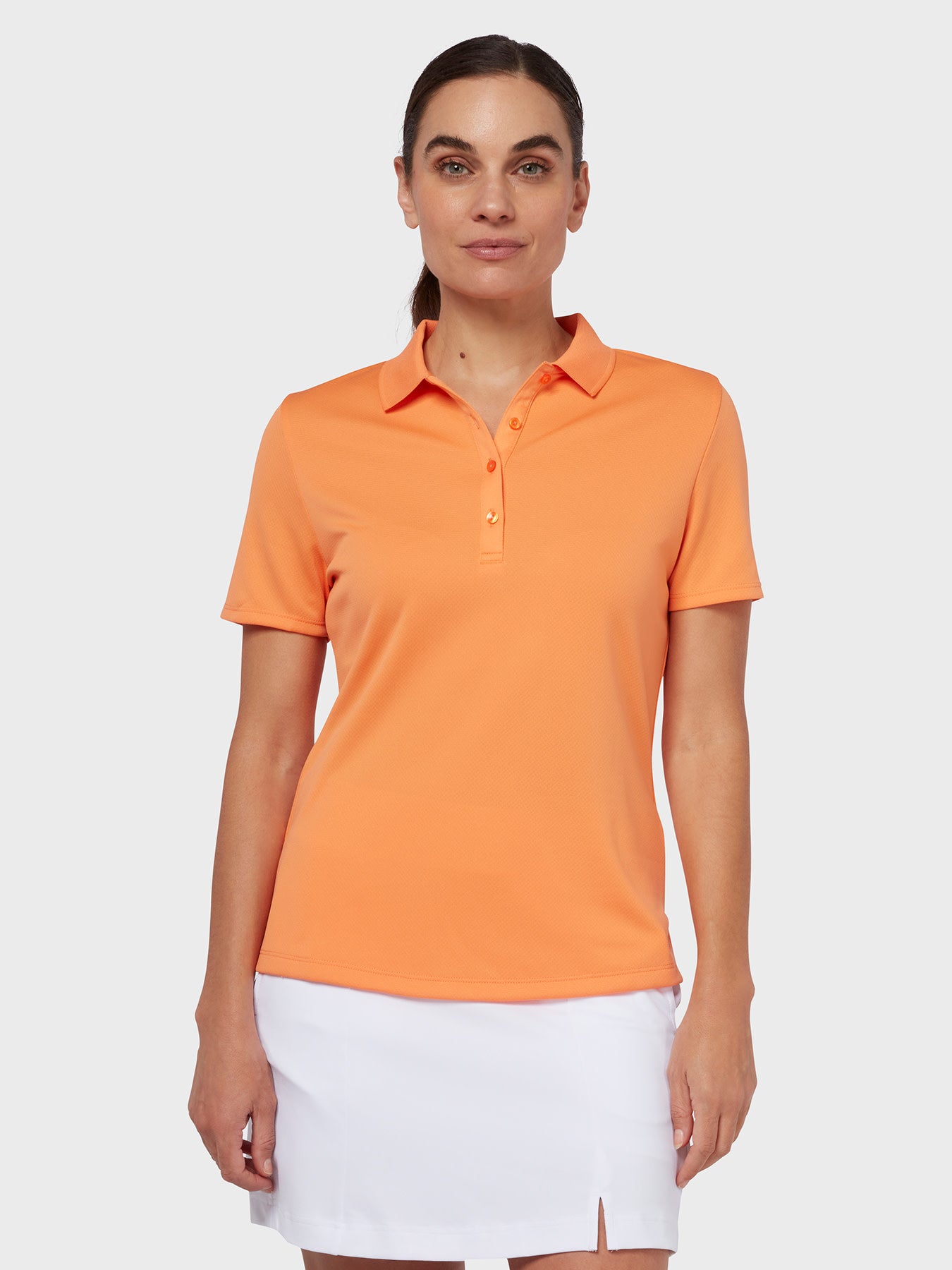 View Swing Tech Womens Polo In Nectarine Nectarine M information