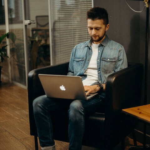 creative entrepreneur working on his laptop