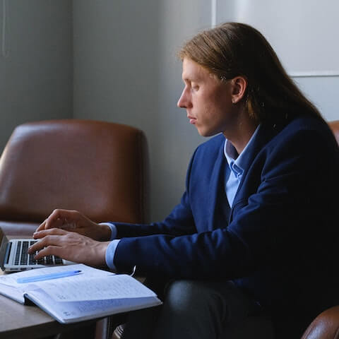 A male creative entrepreneur leader, preparing for a meeting