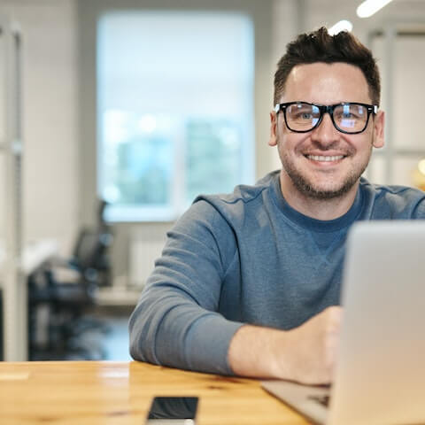 Creative entrepreneur working at his laptop