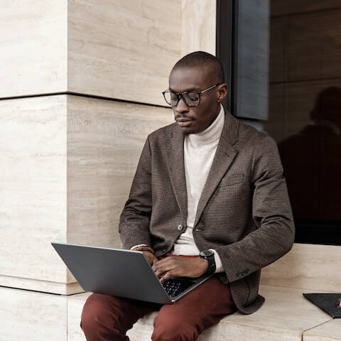 Creative entrepreneur working on his laptop