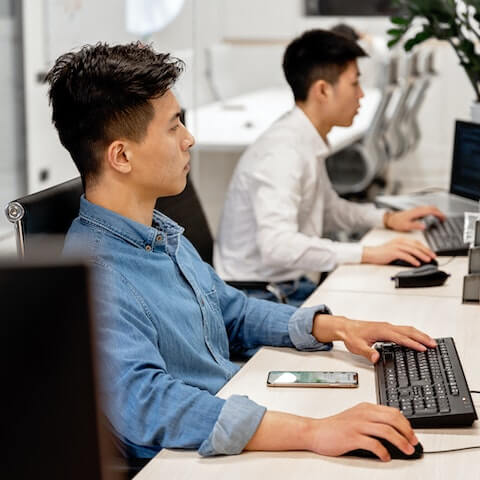 Creative entrepreneurs working in a shared office