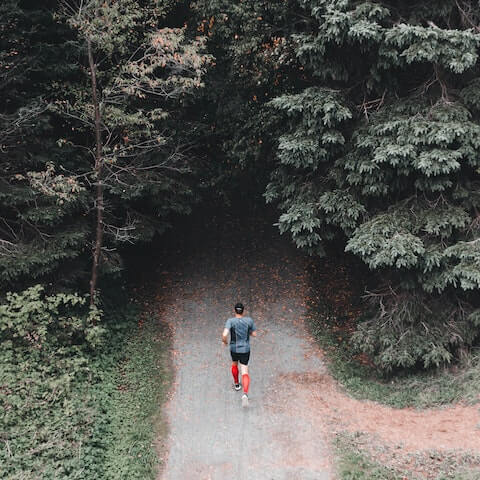 Male business founder going for a run to boost his productivity