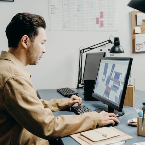 Multi passionate furniture designer working at his desk