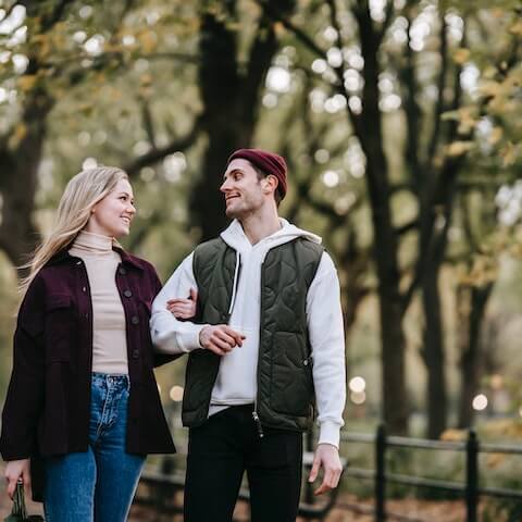 creative couple focusing on their self care taking a walk in the garden