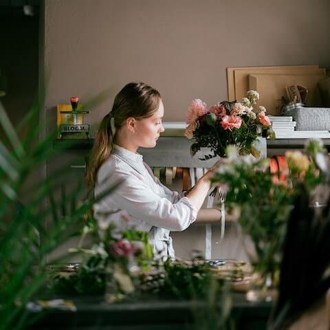 creative entrepreneur flower arranging