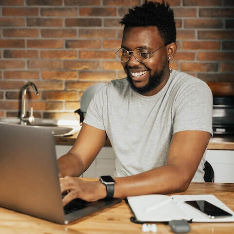 creative entrepreneur working on laptop