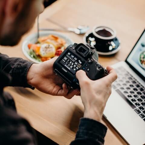 creative photographer taking photos of food