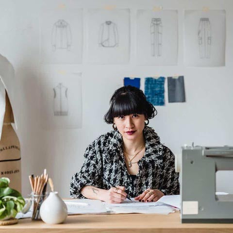 designer at her desk