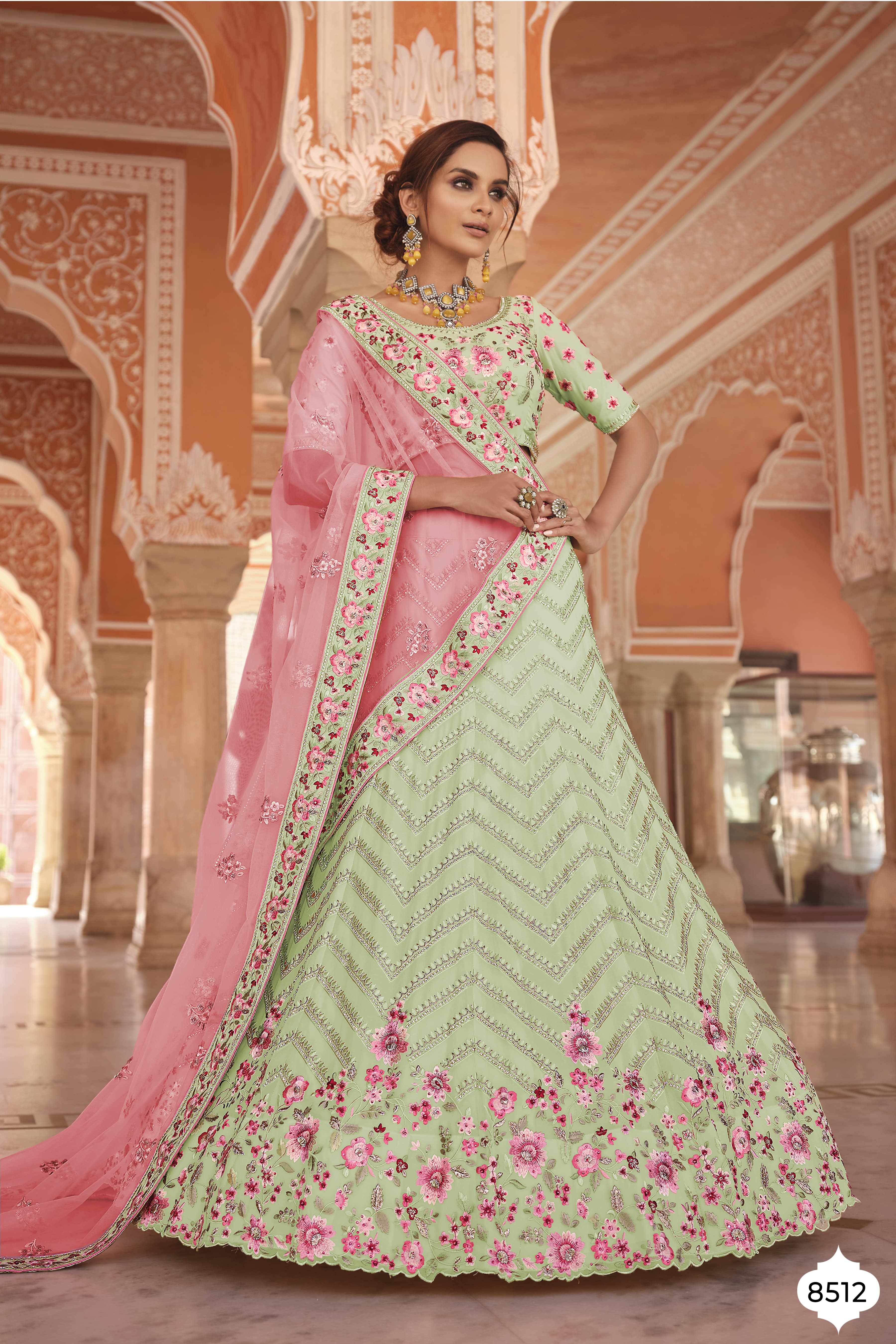 Women's Heavy Net Green Lehenga Choli, this catalog fabric is silk,