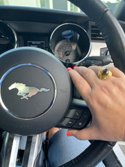 citrine ring on steering wheel