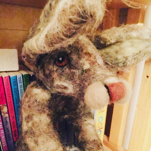 a rabbit made from needle felted wool