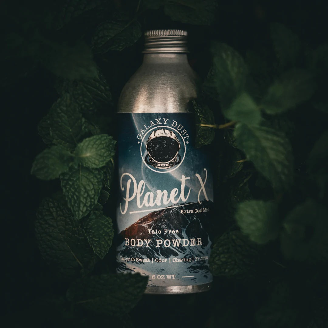 A bottle of Planet X extra cooling body powder