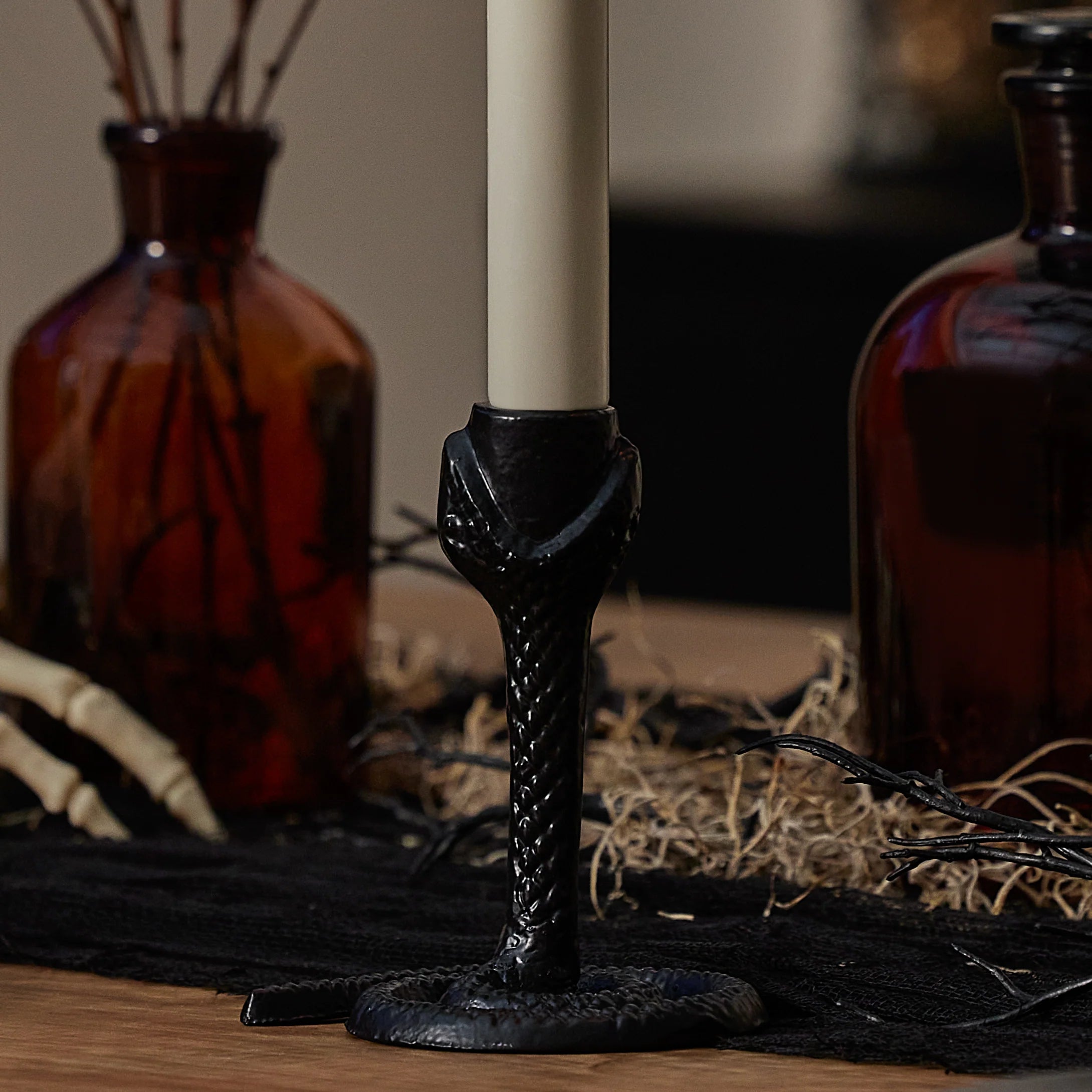 img-Black-Wrought-Iron-Snake-Taper-Holders.webp__PID:7780e598-b316-484b-baaa-adb68aaf3f26