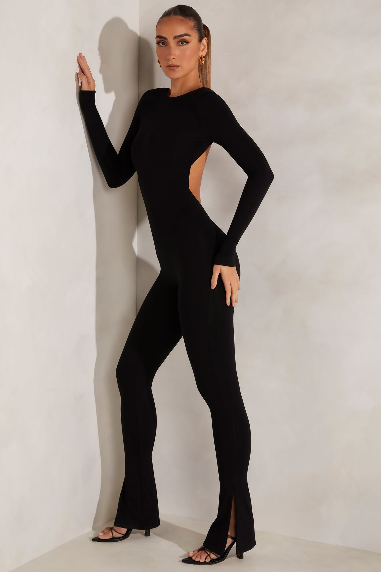 Rumer High Neck Open Back Jumpsuit in Black | Oh Polly