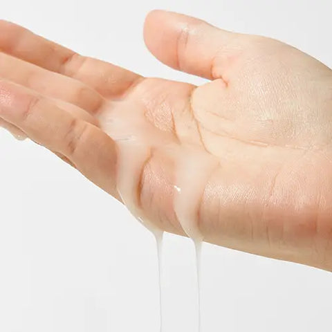 Hand with lube dripping out of palm