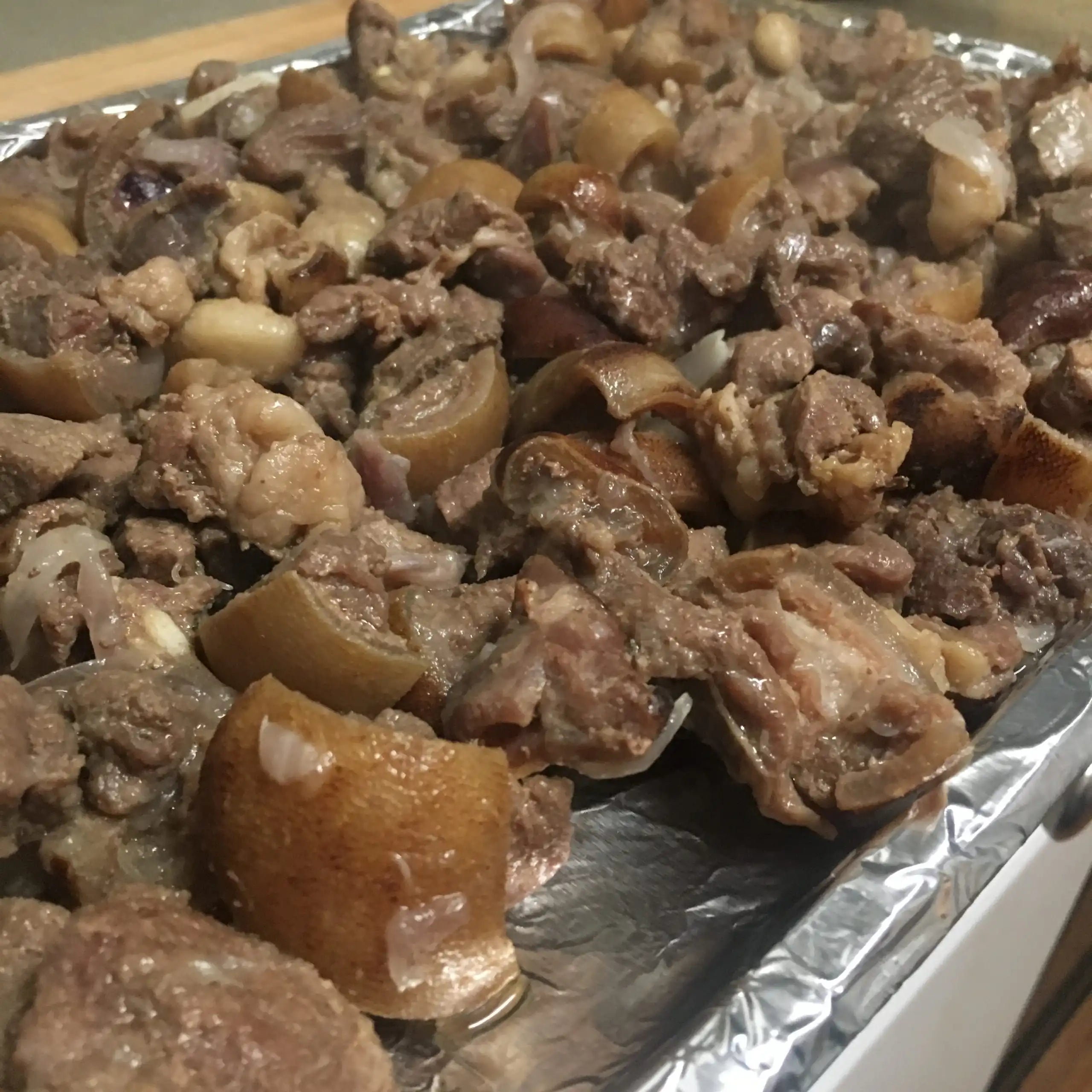 Cooked Goat Meat in a Baking Tray - Adun