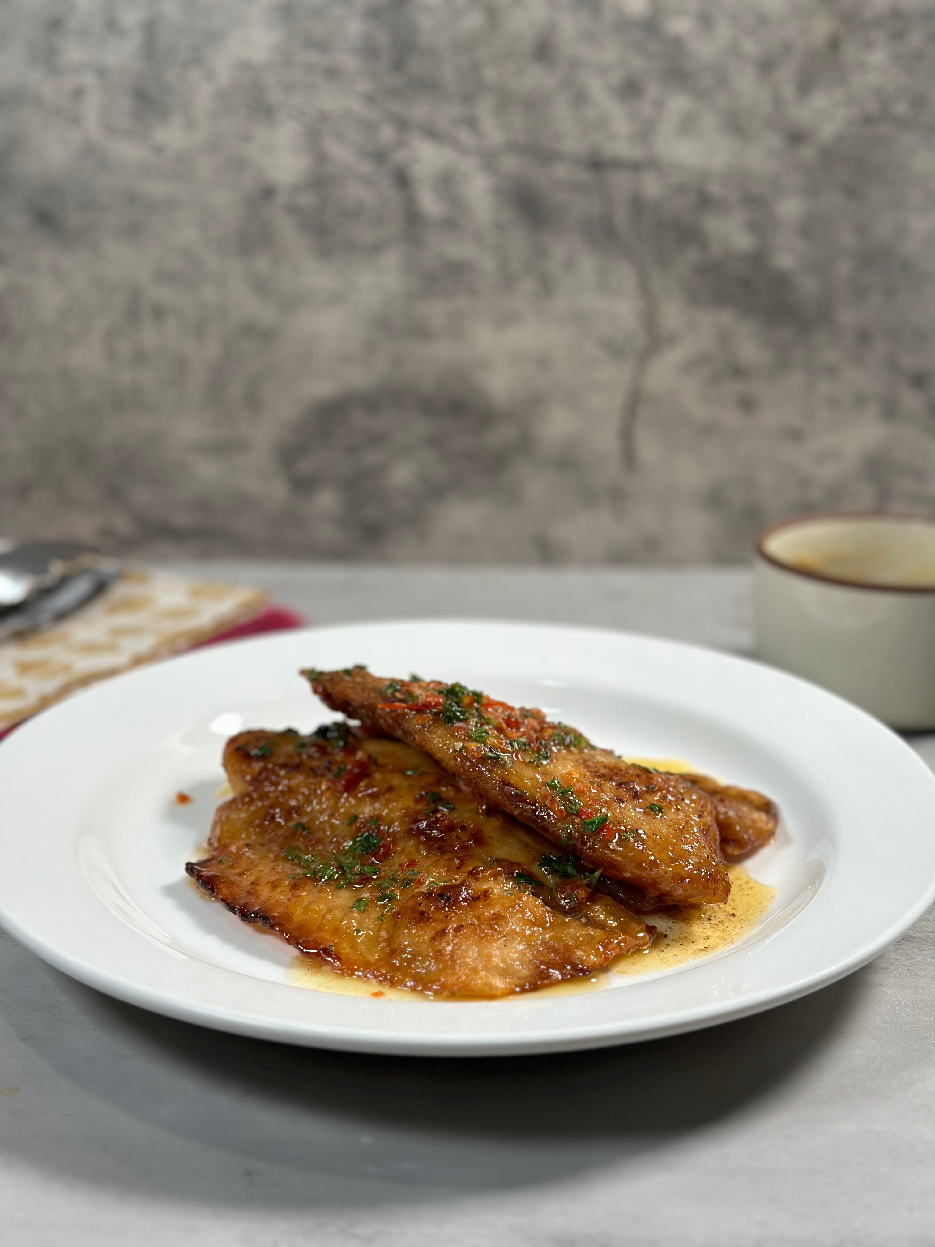 Crispy Fish and Spicy Lemon Butter in a Plate.jpg