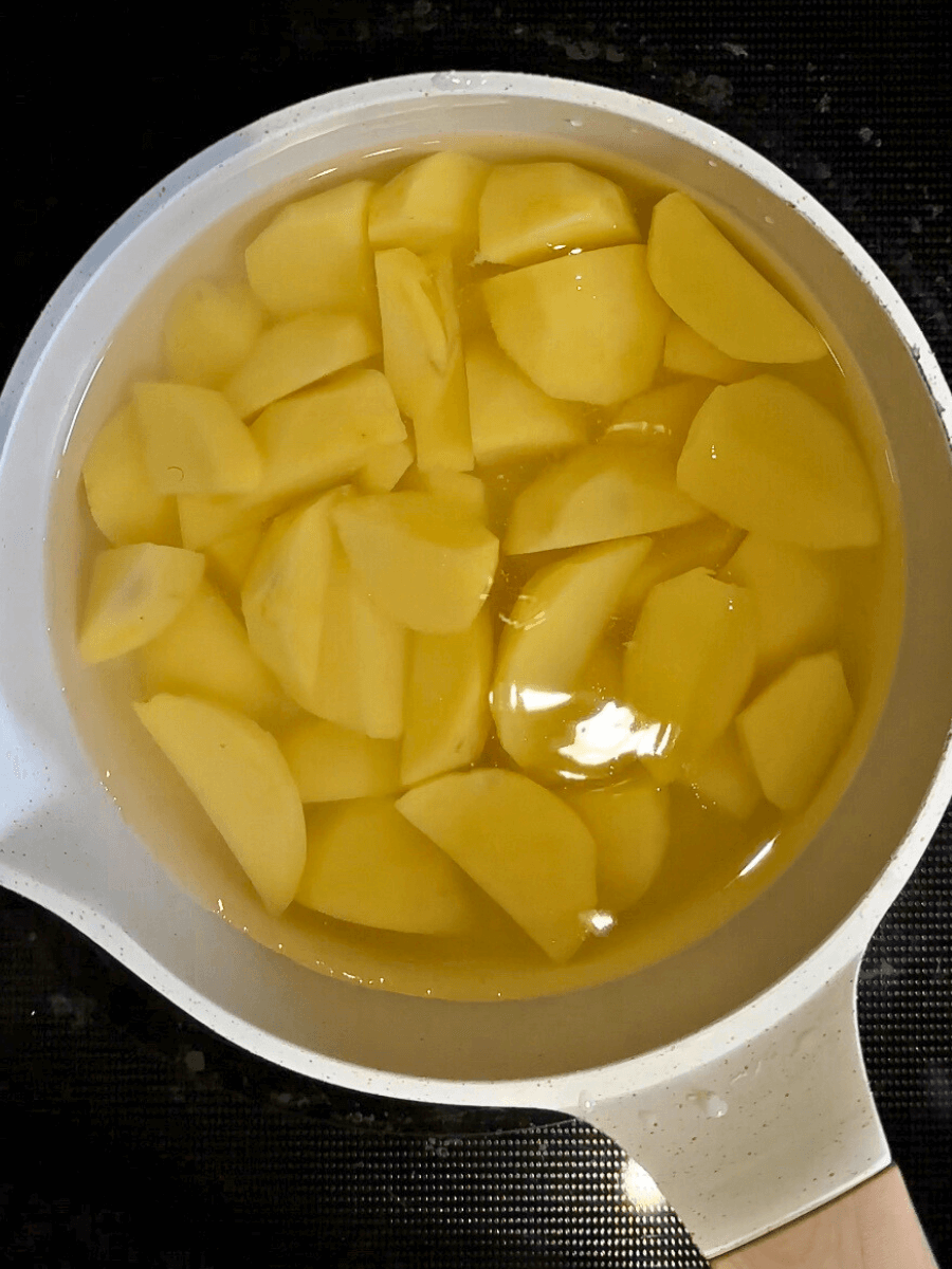 Peeled Potatoes in a Pot