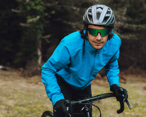 a man cycling wearing sporty wraparound sunglasses