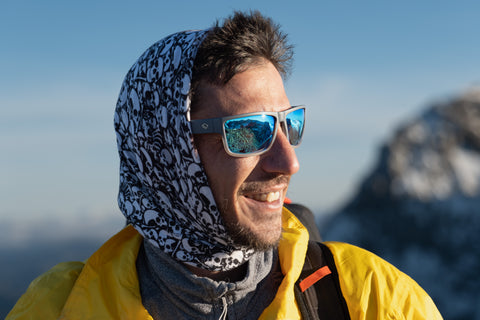 a hiker wearing polarized sunglasses