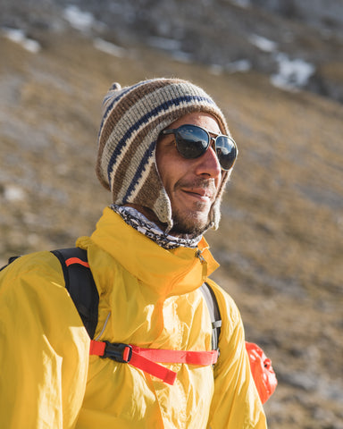 a hiker wearing Torege sunglasses enjoying landscapes