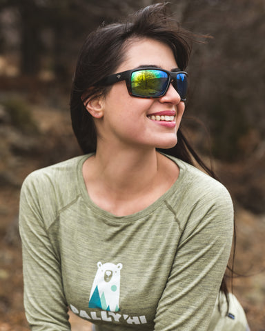 a women wearing polarized sunglasses