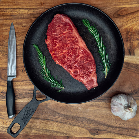 Fellers Ranch Wagyu New York Strip Steak - Prepared with Rosemary and Garlic 