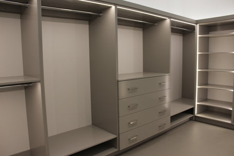 Walk-in master closet with built-in LED lighting