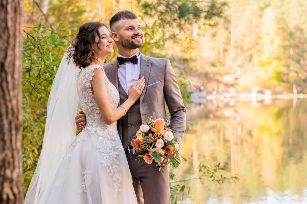 Wedding couple poses for a picture