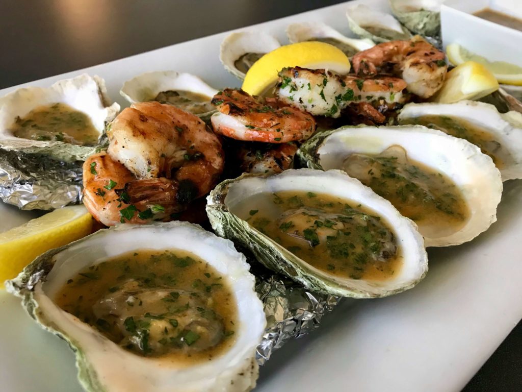grilled oysters and shrimp with butter and lemon