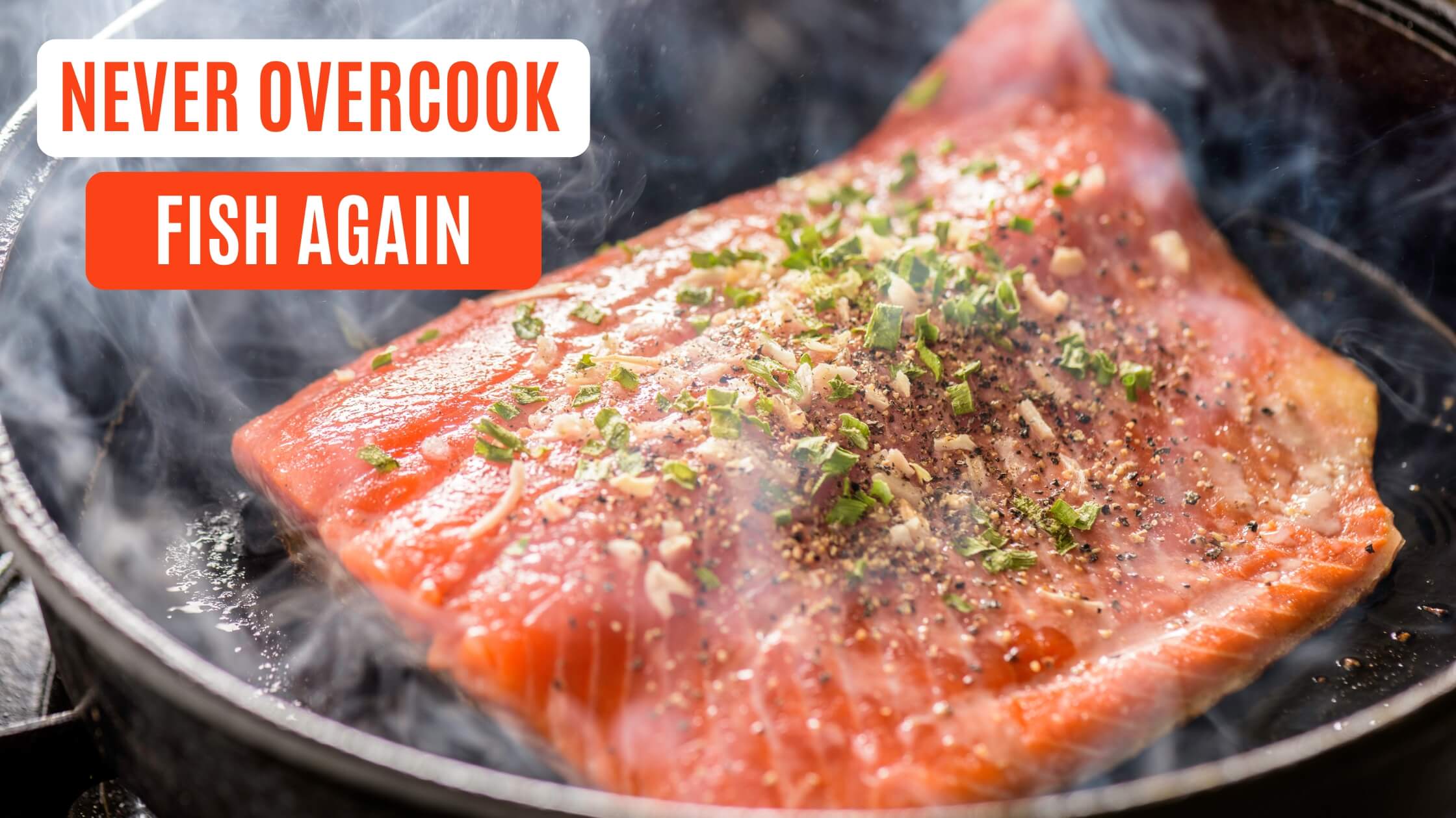 salmon cooking in cast iron pan