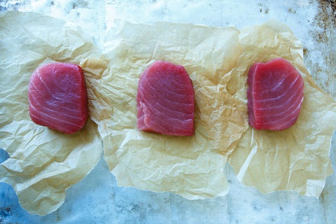 fresh fish on parchment paper