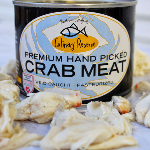 pieces of jumbo crab meat in front of a can of culinary reserve crab