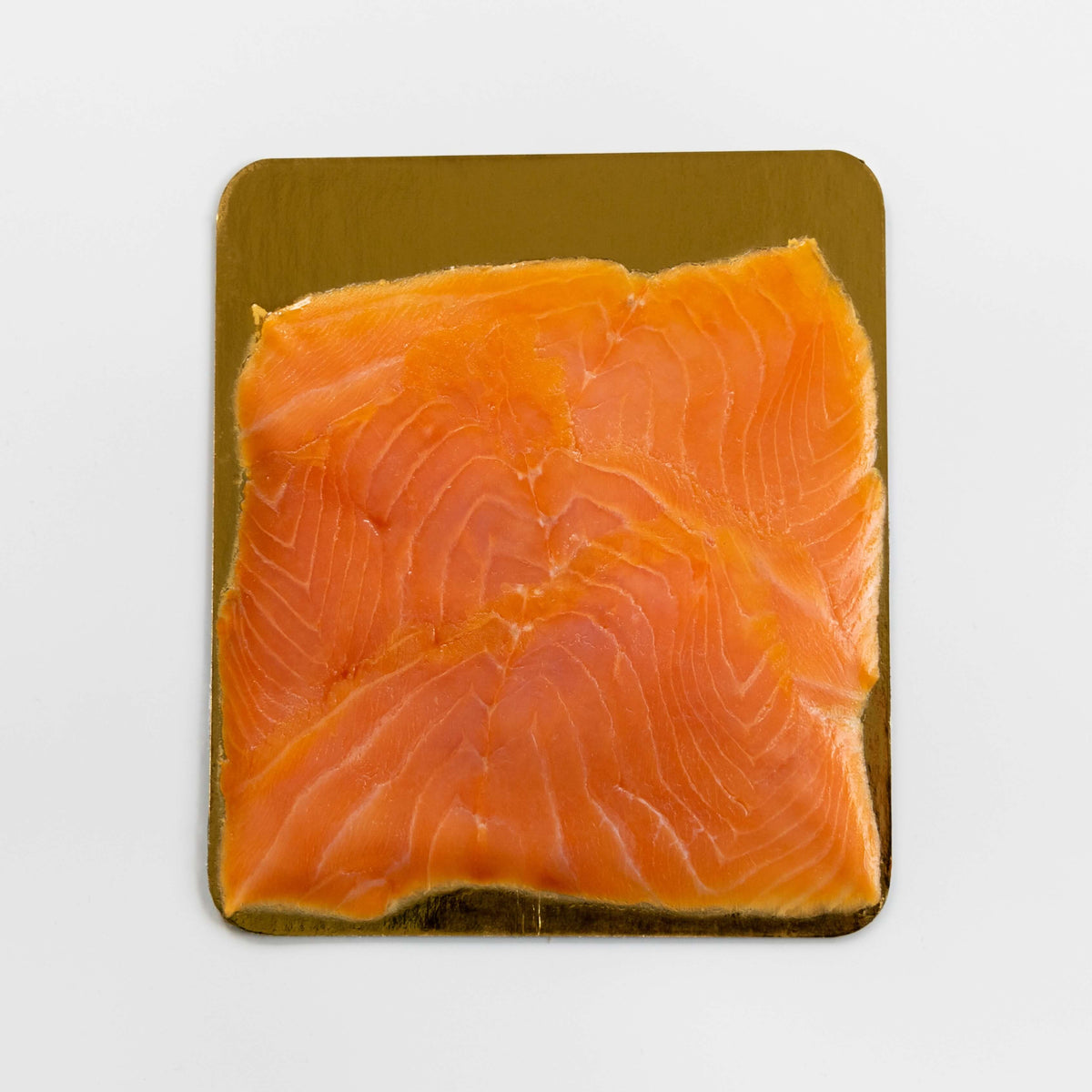 https://cdn.shopify.com/s/files/1/0588/8527/5820/products/smokedsalmon4oz_cropped_1_1200x.jpg?v=1636750316