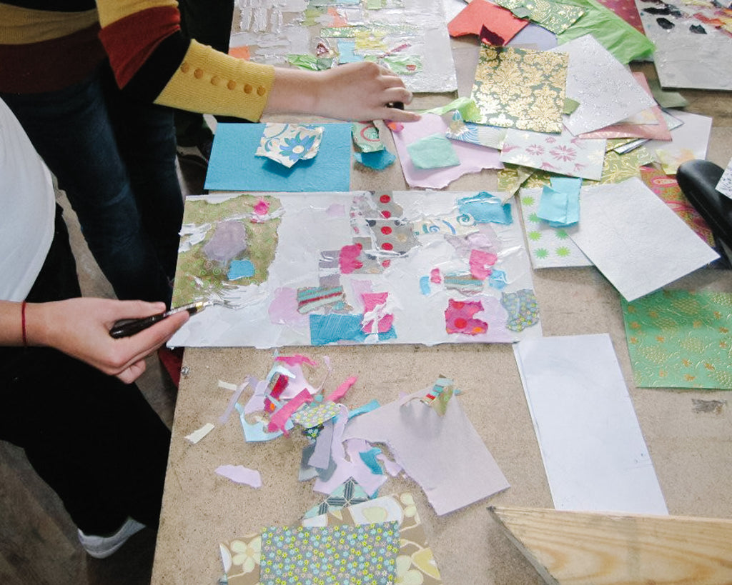 Artist educator, Elli Milan, teaches a mixed media art class in Uzghorod, Ukraine