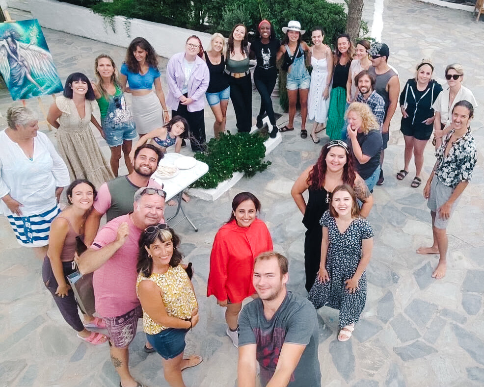 The contestants, judges, host, and film crew for The Outstanding Artist gathered together in Spetses, Greece