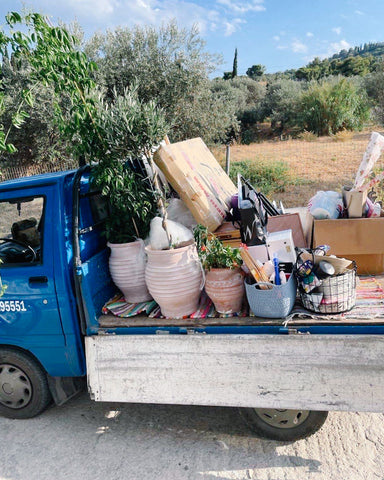 Delivery truck of home decor, flowers, plants, and trees to spruce up hotel