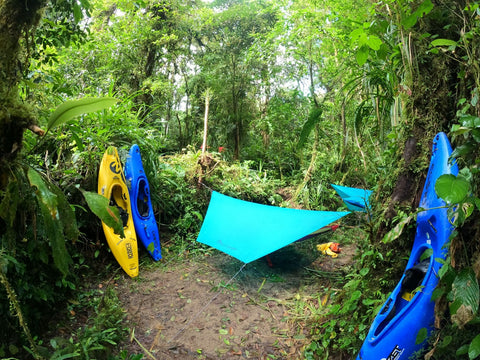 jungle with kayaks and hammocks