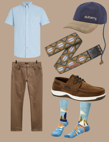 Brown collage with men’s summer outfit including blue Tommy Hilfiger shirt, GANT desert trousers, patterned belt, cap, sailing socks, and Dubarry deck shoes.