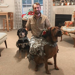 Adam Patterson, CPBT-KA, with his dogs Molly and Artie