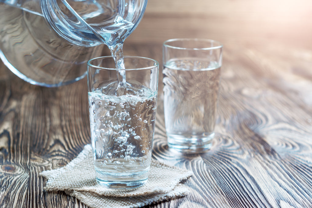 Pouring Water Into Glasses 