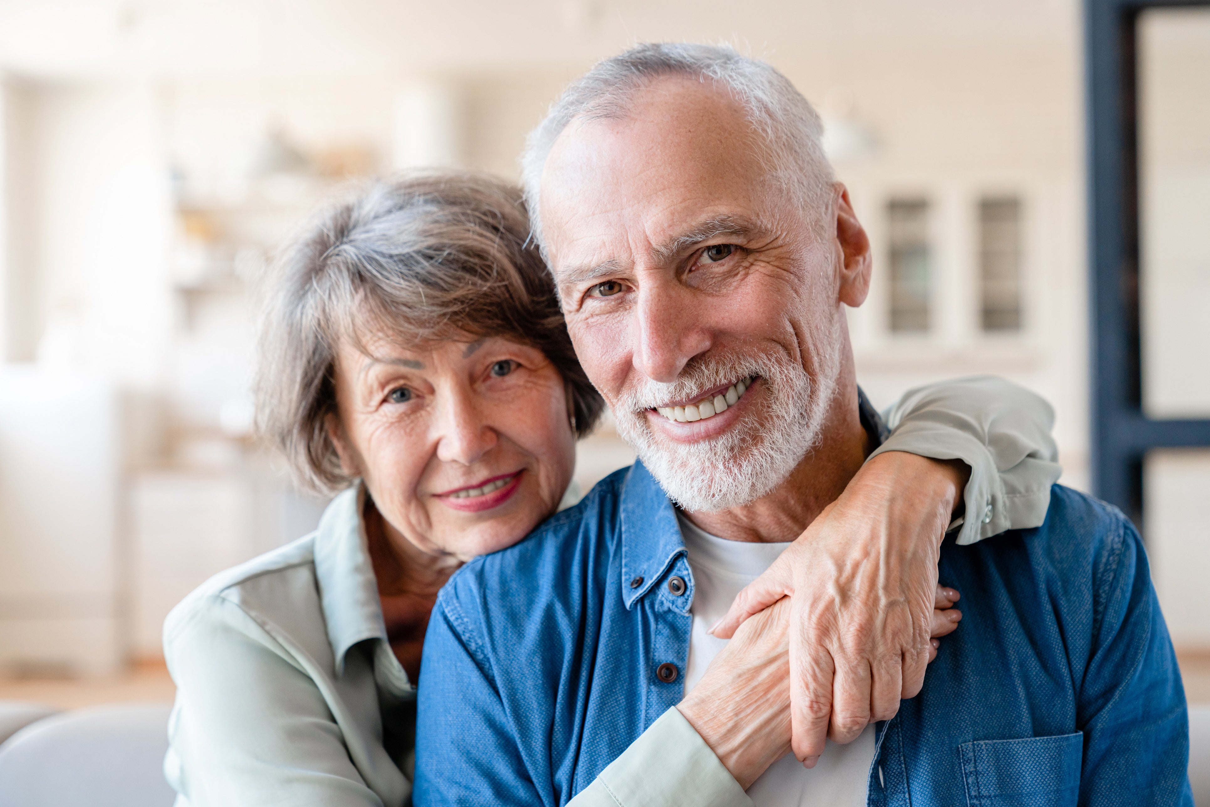 Elderly Couple Smiling for Couple Interview
