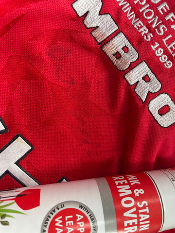 MX14 stain remover applied to a football shrit - the print starts to fade